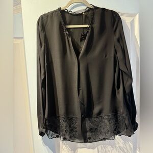 Elie Tahari silk blouse black , size L  design floral print trim. Long sleeve .